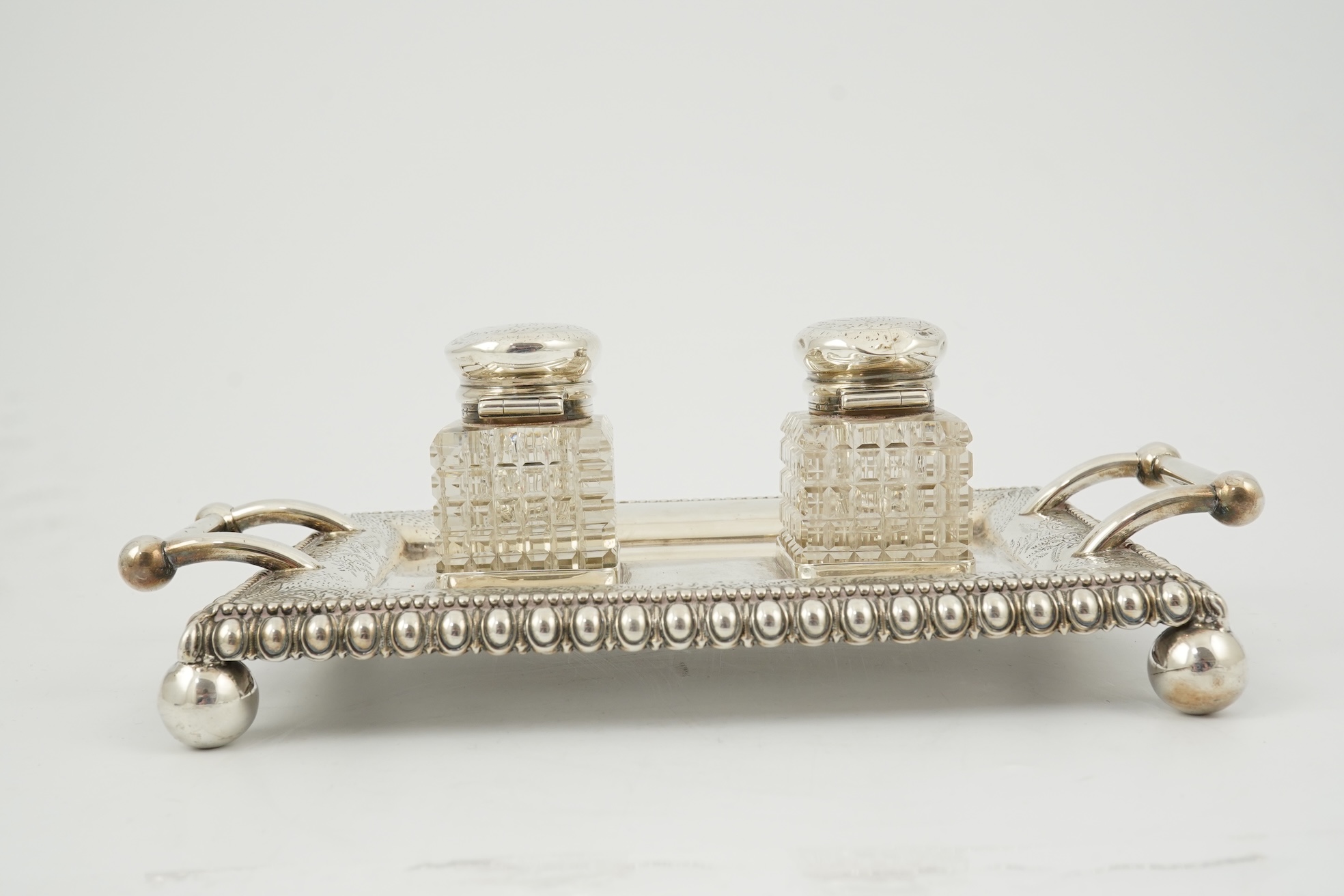 A late Victorian silver two handled rectangular inkstand by George Unite